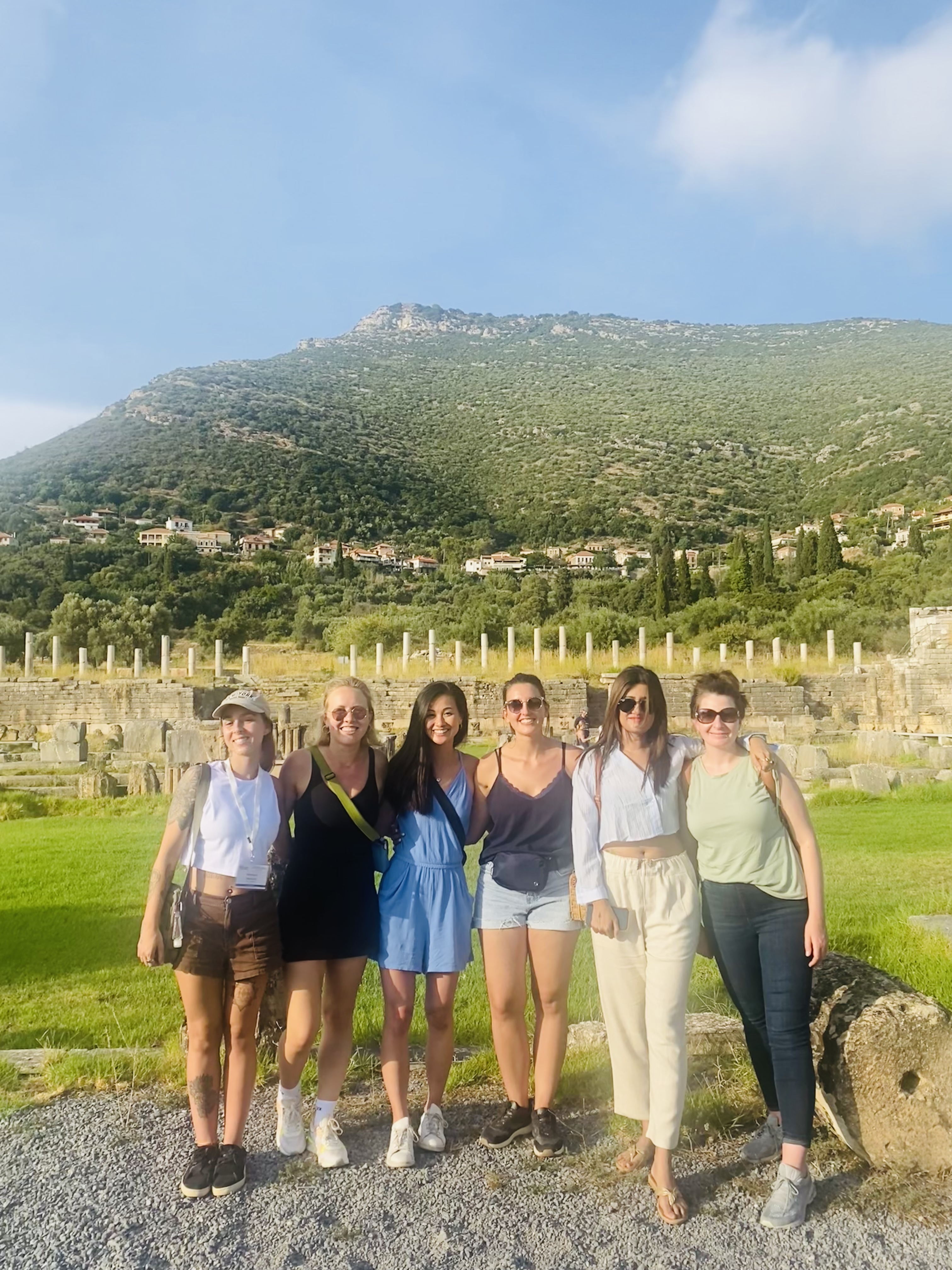 Priya with colleagues at conference in Greece